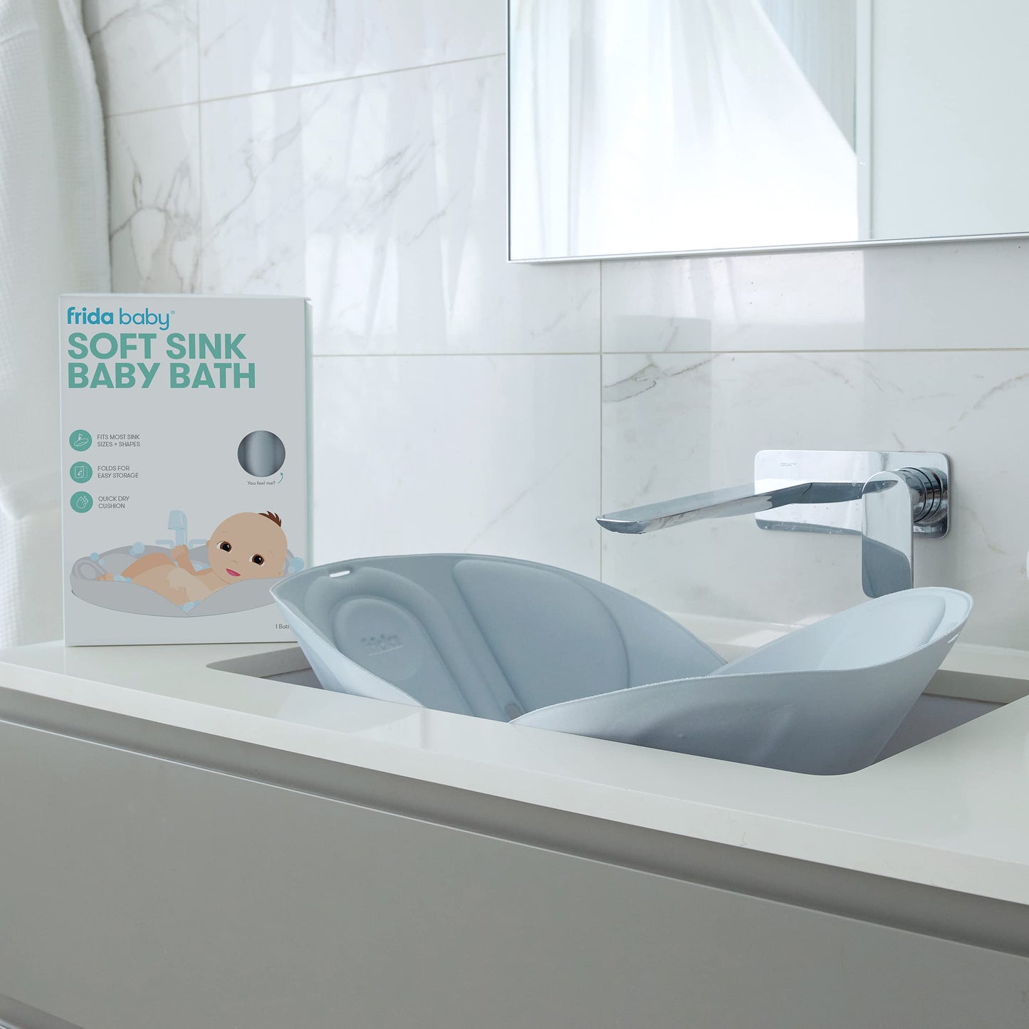 Frida Baby Soft Sink Baby Bath Seat | Sink Bather for Baby | Easy to Clean Baby Bathtub + Bath Cushion That Supports Baby's Head